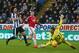 NEWCASTLE UPON TYNE, ENGLAND - JANUARY 12: Wayne Rooney of Manchester United shoots wide as goalkeeper Robert Elliot of Newcastle United dives for the ball during the Barclays Premier League match between Newcastle United and Manchester United at St James' Park on January 12, 2016 at Newcastle upon Tyne, England. (Photo by Ian MacNicol/Getty Images)