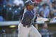 San Diego Padres left fielder Justin Upton (10) follows the flight of his RBI-double against the Colorado Rockies in the fifth inning of a baseball game Sunday, Sept. 20, 2015, in Denver. San Diego won 10-4. (AP Photo/David Zalubowski)
