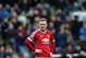 Manchester United's captain Wayne Rooney stands dejected after missing a chance to score during the English Premier League soccer match between Newcastle United and Manchester United at St James' Park, Newcastle, England, Tuesday, Jan. 12, 2015. (AP Photo/Scott Heppell)