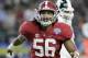 Alabama linebacker Tim Williams (56) celebrates after tackling Michigan State quarterback Connor Cook (18) causing intentional grounding call against Michigan State during the second half of the Cotton Bowl NCAA college football semifinal playoff game, Thursday, Dec. 31, 2015, in Arlington, Texas. (AP Photo/LM Otero)