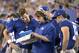 New York Giants offensive coordinator Ben McAdoo confers with quarterbacks Eli Manning, left, and Ryan Nassib, right, during the first half of a preseason NFL football game Saturday, Aug. 22, 2015, in East Rutherford, N.J. (AP Photo/Bill Kostroun)
