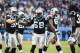 Nov 8, 2015; Charlotte, NC, USA; Carolina Panthers outside linebacker Thomas Davis (58) celebrates with middle linebacker A.J. Klein (56) and free safety Tre Boston (33) after intercepting the ball late in the fourth quarter. The Panthers defeated the Packers 37-29 at Bank of America Stadium. Mandatory Credit: Bob Donnan-USA TODAY Sports