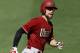 Arizona Diamondbacks Ender Inciarte looks at his bench, rounding third, after hitting a solo home run during the fifth inning of a baseball game against the San Diego Padres in San Diego, Sunday, Sept. 27, 2015. (AP Photo/Alex Gallardo)