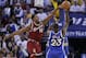 Cleveland Cavaliers' Tristan Thompson (13) in action against the Golden State Warriors' Draymond Green during an NBA basketball game Friday, Dec. 25, 2015, in Oakland, Calif. (AP Photo/Marcio Jose Sanchez)