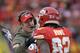 Kansas City Chiefs wide receiver Dwayne Bowe (82) is congratulated by Offensive Coordinator Doug Pederson after a touchdown during the second half of an NFL football game in Kansas City, Mo., Sunday, Nov. 24, 2013. (AP Photo/Reed Hoffmann)