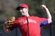 Philadelphia Phillies starting pitcher Cliff Lee throws during a spring training baseball workout, Thursday, Feb. 19, 2015, in Clearwater, Fla. (AP Photo/Lynne Sladky)