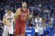 New Orleans Pelicans forward Ryan Anderson (33) reacts after scoring a three-point basket in front of Orlando Magic forward Jason Smith (14) and forward Tobias Harris (12) during the first half of an NBA basketball game in Orlando, Fla., Monday, Dec. 28, 2015. (AP Photo/Phelan M. Ebenhack)