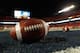 MIAMI GARDENS, FL - JANUARY 04: A detail of a Nike official NCAA size football as it sits in the end zone while the West Virginia Mountaineers stretchon the field prior to playing against the Clemson Tigers during the Discover Orange Bowl at Sun Life Stadium on January 4, 2012 in Miami Gardens, Florida. (Photo by Streeter Lecka/Getty Images)