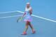 SYDNEY, AUSTRALIA - JANUARY 15: Svetlana Kuznetsova of Russia celebrates winning match point in her semi final match against Simona Halep of Romania during day six of the 2016 Sydney International at Sydney Olympic Park Tennis Centre on January 15, 2016 in Sydney, Australia. (Photo by Mark Metcalfe/Getty Images)