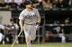 Tampa Bay Rays' Logan Forsythe watches his sacrifice fly off Chicago White Sox starting pitcher Jose Quintana, scoring Joey Butler, during the fifth inning of a baseball game Monday, Aug. 3, 2015, in Chicago. (AP Photo/Charles Rex Arbogast)