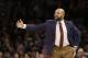 New York Knicks' head coach Derek Fisher talks to players during the first half of the NBA basketball game against the Milwaukee Bucks, Sunday, Jan. 10, 2016 in New York. (AP Photo/Seth Wenig)