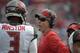 FILE - In this Nov. 15, 2015, file photo, Tampa Bay Buccaneers offensive coordinator Dirk Koetter talks to quarterback Jameis Winston (3) during an NFL football game against the Dallas Cowboys, in Tampa, Fla. The Tampa Bay Buccaneers announced that they have named Dirk Koetter the 11th head coach in franchise history, Friday, Jan. 15, 2016. (AP Photo/Phelan M. Ebenhack, File)