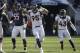 Denver Broncos defensive end Derek Wolfe (95) celebrates after tackling Chicago Bears quarterback Jay Cutler (6) during the first half of an NFL football game, Sunday, Nov. 22, 2015, in Chicago. (AP Photo/Nam Y. Huh)