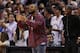 TORONTO, ON - NOVEMBER 25: Singer Drake celebrates a Raptors score on 'Drake Night' during an NBA game between the Cleveland Cavaliers and the Toronto Raptors at the Air Canada Centre on November 25, 2015 in Toronto, Ontario, Canada. NOTE TO USER: User expressly acknowledges and agrees that, by downloading and or using this photograph, User is consenting to the terms and conditions of the Getty Images License Agreement. (Photo by Vaughn Ridley/Getty Images)