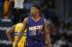 Phoenix Suns guard Ronnie Price (14) in the second half of an NBA basketball game Friday, Nov. 20, 2015, in Denver. Phoenix won 114-107. (AP Photo/David Zalubowski)