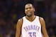 OKLAHOMA CITY, OK - JANUARY 13: Kevin Durant #35 of the Oklahoma City Thunder talks with a teammate during a game against the Dallas Mavericks at Chesapeake Energy Arena on January 13, 2016 in Oklahoma City, Oklahoma. NOTE TO USER: User expressly acknowledges and agrees that, by downloading and or using this photograph, User is consenting to the terms and conditions of the Getty Images License Agreement. The Thunder defeated the Mavericks 108-89. (Photo by Wesley Hitt/Getty Images)
