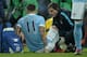 Manchester City's Serbian defender Aleksandar Kolarov (L) receives medical treatment before being taken off of the pitch on a stretcher during the English Premier League football match between Manchester City and Crystal Palace at the Etihad Stadium in Manchester, north west England, on January 16, 2016. AFP PHOTO / OLI SCARFF
RESTRICTED TO EDITORIAL USE. No use with unauthorized audio, video, data, fixture lists, club/league logos or 'live' services. Online in-match use limited to 75 images, no video emulation. No use in betting, games or single club/league/player publications. / AFP / OLI SCARFF (Photo credit should read OLI SCARFF/AFP/Getty Images)