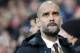 FILE - In this Saturday, Dec. 19, 2015 file photo, Bayern head coach Pep Guardiola arrives for the German Bundesliga soccer match between Hannover 96 and FC Bayern Munich in Hannover, Germany. Pep Guardiola says he wants to coach in the English Premier League when he leaves Bayern Munich at the end of this season, but hasn't yet signed a contract with a club. Guardiola, who opted not to extend his three-year contract at Bayern, said on Tuesday, Jan. 5, 2016