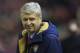 Arsenal's manager Arsene Wenger takes to the touchline before his team's English Premier League soccer match between Liverpool and Arsenal at Anfield Stadium, Liverpool, England, Wednesday, Jan. 13, 2016. (AP Photo/Jon Super)