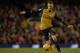 Arsenal's Welsh midfielder Aaron Ramsey controls the ball during the English Premier League football match between Liverpool and Arsenal at Anfield stadium in Liverpool, north-west England on January 13, 2016.
AFP PHOTO / PAUL ELLIS
RESTRICTED TO EDITORIAL USE. NO USE WITH UNAUTHORIZED AUDIO, VIDEO, DATA, FIXTURE LISTS, CLUB/LEAGUE LOGOS OR 'LIVE' SERVICES. ONLINE IN-MATCH USE LIMITED TO 75 IMAGES, NO VIDEO EMULATION. NO USE IN BETTING, GAMES OR SINGLE CLUB/LEAGUE/PLAYER PUBLICATIONS. / AFP / PAUL ELLIS (Photo credit should read PAUL ELLIS/AFP/Getty Images)