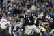Carolina Panthers' Cam Newton (1) looks to pass against the Tampa Bay Buccaneers during the second half of an NFL football game in Charlotte, N.C., Sunday, Jan. 3, 2016. The Panthers won 38-10. (AP Photo/Bob Leverone)
