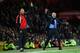 MANCHESTER, ENGLAND - OCTOBER 26: Chelsea Manager Jose Mourinho (R) protests during the Barclays Premier League match between Manchester United and Chelsea at Old Trafford on October 26, 2014 in Manchester, England. (Photo by Laurence Griffiths/Getty Images)