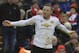 Manchester United's English striker Wayne Rooney celebrates scoring the opening goal during the English Premier League football match between Liverpool and Manchester United at Anfield in Liverpool, northwest England, on January 17, 2016. AFP PHOTO / PAUL ELLIS
RESTRICTED TO EDITORIAL USE. No use with unauthorized audio, video, data, fixture lists, club/league logos or 'live' services. Online in-match use limited to 75 images, no video emulation. No use in betting, games or single club/league/player publications. / AFP / PAUL ELLIS (Photo credit should read PAUL ELLIS/AFP/Getty Images)