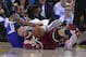 December 25, 2015; Oakland, CA, USA; Cleveland Cavaliers guard Matthew Dellavedova (8, bottom) and Golden State Warriors forward Andre Iguodala (9, top) fight for the ball in the second quarter of a NBA basketball game on Christmas at Oracle Arena. Mandatory Credit: Kyle Terada-USA TODAY Sports