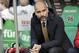 Bayern head coach Pep Guardiola sits on the bench as he arrives for the German Bundesliga soccer match between Hannover 96 and FC Bayern Munich in Hannover, Germany, Saturday, Dec. 19, 2015. (AP Photo/Michael Sohn)
