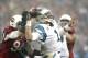 Carolina Panthers' Cam Newton (1) has his pass deflected by Arizona Cardinals' Sam Acho (94) during the second half of an NFL wild card playoff football game in Charlotte, N.C., Saturday, Jan. 3, 2015. The Panthers won 27-16. (AP Photo/Bob Leverone)