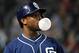 PHOENIX, AZ - SEPTEMBER 14: Justin Upton #10 of the San Diego Padres blows a bubble while in the on deck circle in the fifth inning during a game against the Arizona Diamondbacks at Chase Field on September 14, 2015 in Phoenix, Arizona. (Photo by Norm Hall/Getty Images)
