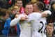 LIVERPOOL, ENGLAND - JANUARY 17: Wayne Rooney of Manchester United celebrates scoring the opening goal with Morgan Schneiderlin of Manchester United during the Barclays Premier League match between Liverpool and Manchester United at Anfield on January 17, 2016 in Liverpool, England. (Photo by Alex Livesey/Getty Images)