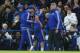Chelsea's Brazilian-born Spanish striker Diego Costa (C) is helped from the field injured past Chelsea's Dutch manager Guus Hiddink (R) during the English Premier League football match between Chelsea and Everton at Stamford Bridge in London on January 16, 2016. AFP PHOTO / JUSTIN TALLIS
RESTRICTED TO EDITORIAL USE. No use with unauthorized audio, video, data, fixture lists, club/league logos or 'live' services. Online in-match use limited to 75 images, no video emulation. No use in betting, games or single club/league/player publications. / AFP / JUSTIN TALLIS (Photo credit should read JUSTIN TALLIS/AFP/Getty Images)
