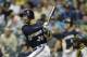 MILWAUKEE, WI - SEPTEMBER 01: Jonathan Lucroy #20 of the Milwaukee Brewers makes some contact at the plate during the game against the Pittsburgh Pirates at Miller Park on September 01, 2015 in Milwaukee, Wisconsin. (Photo by Mike McGinnis/Getty Images)