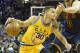 Jan 18, 2016; Cleveland, OH, USA; Golden State Warriors guard Stephen Curry (30) drives against Cleveland Cavaliers forward Kevin Love (0) in the first quarter at Quicken Loans Arena. Mandatory Credit: David Richard-USA TODAY Sports