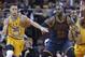 Golden State Warriors’ Stephen Curry (30) knocks the ball loose from Cleveland Cavaliers' LeBron James (23) in the first half of an NBA basketball game, Monday, Jan. 18, 2016, in Cleveland. Andre Iguodala (9) is at right. (AP Photo/Tony Dejak)