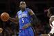 Jan 4, 2016; Auburn Hills, MI, USA; Orlando Magic guard Victor Oladipo (5) dribbles the ball against Detroit Pistons guard Reggie Jackson (1) during the first quarter at The Palace of Auburn Hills. Mandatory Credit: Raj Mehta-USA TODAY Sports