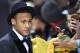 FC Barcelona and Brazils forward Neymar poses on the red carpet as he arrives for the 2015 FIFA Ballon d'Or award ceremony at the Kongresshaus in Zurich on January 11, 2016. AFP PHOTO / MICHAEL BUHOLZER / AFP / MICHAEL BUHOLZER (Photo credit should read MICHAEL BUHOLZER/AFP/Getty Images)