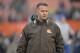 Cleveland Browns offensive coordinator John DeFilippo stands on the field during an NFL football game between the Pittsburgh Steelers and the Browns, Sunday, Jan. 3, 2016, in Cleveland. The Steelers won 28-12. (AP Photo/David Richard)