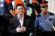 FILE - In this Sept. 27, 2013 file photo, FC Barcelona star Lionel Messi, left, arrives at a court to answer questions in a tax fraud case in Gava, near Barcelona, Spain. Spanish court officials say Lionel Messi's tax fraud trial has been set for May 31-June 3, 2016. Messi and his father, Jorge Horacio Messi, have been charged with three counts of tax fraud and could be sentenced to nearly two years in prison if found guilty. They are accused of defrauding Spain's tax office of 4.1 million euros ($4.4 million) in unpaid taxes from 2007-09. (AP Photo/Emilio Morenatti, File)