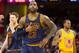 CLEVELAND, OH - JANUARY 18: LeBron James #23 of the Cleveland Cavaliers reacts during the second half against the Golden State Warriors at Quicken Loans Arena on January 18, 2016 in Cleveland, Ohio. The Warriors defeated the Cavaliers 132-98. NOTE TO USER: User expressly acknowledges and agrees that, by downloading and/or using this photograph, user is consenting to the terms and conditions of the Getty Images License Agreement. Mandatory copyright notice. (Photo by Jason Miller/Getty Images)