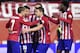 Atletico Madrid players celebrate a goal during the Spanish Copa del Rey (King's Cup) round of 16 second leg football match Club Atletico de Madrid vs CF Rayo Vallecano at Vicente Calderon stadium in Madrid on January 14, 2016. AFP PHOTO / JAVIER SORIANO / AFP / JAVIER SORIANO (Photo credit should read JAVIER SORIANO/AFP/Getty Images)