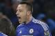 Chelsea's English defender John Terry (C) celebrates scoring a late equalising goal to make the score 3-3 during the English Premier League football match between Chelsea and Everton at Stamford Bridge in London on January 16, 2016. AFP PHOTO / ADRIAN DENNIS
RESTRICTED TO EDITORIAL USE. No use with unauthorized audio, video, data, fixture lists, club/league logos or 'live' services. Online in-match use limited to 75 images, no video emulation. No use in betting, games or single club/league/player publications. / AFP / ADRIAN DENNIS (Photo credit should read ADRIAN DENNIS/AFP/Getty Images)