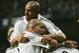 MADRID, SPAIN - DECEMBER 3: Ronaldo (unseen) of Real Madrid celebrates with teammates Roberto Carlos (Above) and Zinedine Zidane after scoring a goal against Getafe during the Primera Liga match between Real Madrid and Getafe on December 3, 2005 at the Santiago Bernabeu stadium in Madrid, Spain. (Photo by Denis Doyle/Getty Images)