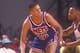LANDOVER, MD - MARCH 25: Tate George #12 of the New Jersey Nets dribbles the ball during a basketball game against the Washington Bullets at the Capitol Centre on March 25 1991 in Landover , Maryland. The Bullets won 113-106. (Photo by Mitchell Layton/Getty Images)