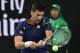 Serbia's Novak Djokovic plays a backhand return during his men's singles match against Italy's Andreas Seppi on day five of the 2016 Australian Open tennis tournament in Melbourne on January 22, 2016. AFP PHOTO / PAUL CROCK-- IMAGE RESTRICTED TO EDITORIAL USE - STRICTLY NO COMMERCIAL USE / AFP / PAUL CROCK (Photo credit should read PAUL CROCK/AFP/Getty Images)