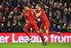 LIVERPOOL, ENGLAND - JANUARY 13: Roberto Firmino (L) of Liverpool celebrates scoring his team's second goal with his team mate Jordan Henderson (R) during the Barclays Premier League match between Liverpool and Arsenal at Anfield on January 13, 2016 in Liverpool, England. (Photo by Alex Livesey/Getty Images)