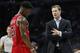 Chicago Bulls' head coach Fred Hoiberg, right, talks with Jimmy Butler, left, during the first half of an NBA basketball game against the Philadelphia 76ers, Thursday, Jan. 14, 2016, in Philadelphia. The Bulls won 115-111 in overtime. (AP Photo/Chris Szagola)