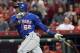 New York Mets Yoenis Cespedes hits an RBI single against the Cincinnati Reds in the seventh inning of a baseball game in Cincinnati, Thursday, Sept. 24, 2015. (AP Photo/Tom Uhlman)