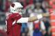 Arizona Cardinals quarterback Carson Palmer (3) calls a play against the Green Bay Packers during the first half of an NFL divisional playoff football game, Saturday, Jan. 16, 2016, in Glendale, Ariz. (AP Photo/Ross D. Franklin)